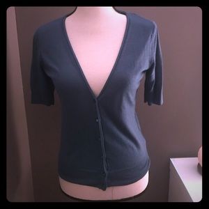 Light-weight cardigan. Teal in color.